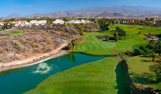 Green golf fairway beside the ocean at Golf del Sur, Tenerife